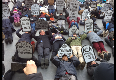 Activists hold ‘die in’ to protest Trump’s new healthcare bill