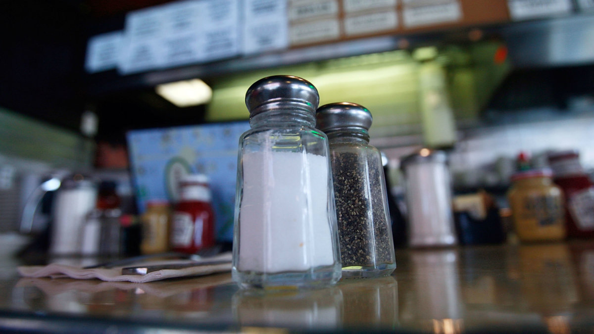 The Reason Some Fancy Restaurants Don't Have Salt And Pepper Shakers