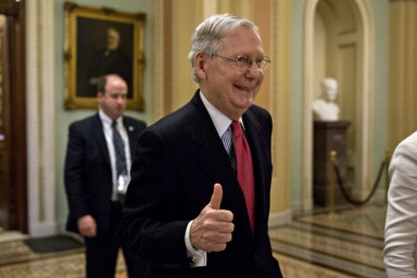 Senate Majority Leader Mitch McConnell, a Republican from Kentucky, gives a thumbs up after passing the rule change to allow confirmation of Neil Gorsuch.