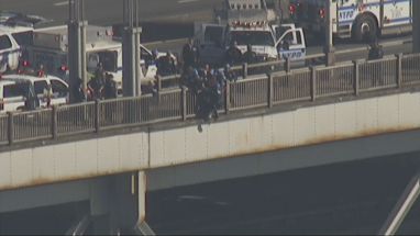 Armed suicidal man on GWB threatens to shoot police officers trying to save