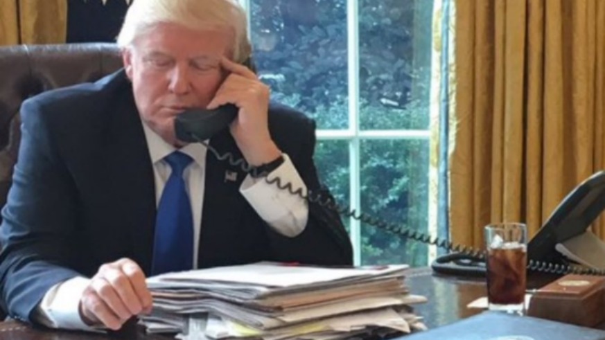 what is the red button on the presidents desk