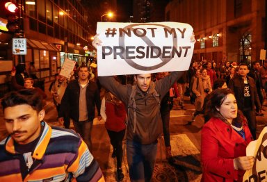 ‘Not my president’: See the photos from the first night’s Trump