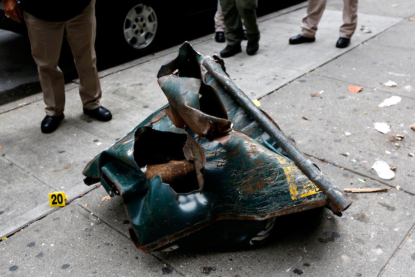 PHOTOS VIDEOS History Of Bombings In New York Metro US   GettyImages Mangled Dumpster 1 