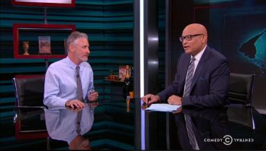 Watch Larry Wilmore send off with old pal Jon Stewart, kind words and booze