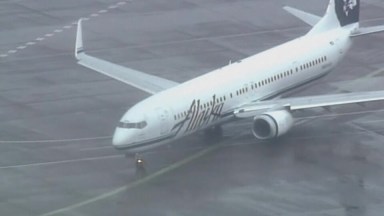 Plane leaves Seattle with napping airport worker stuck in cargo