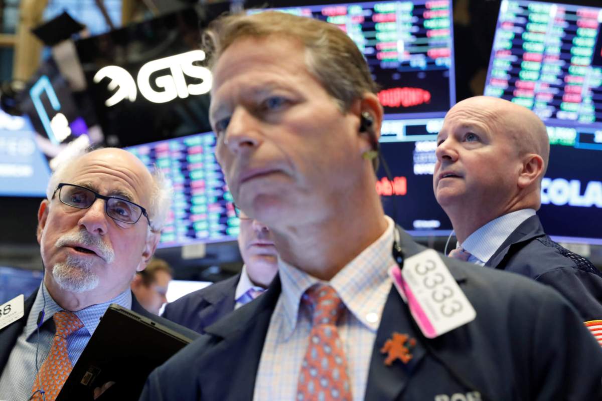 Wall Street mixed on earnings reports; trade worries resurface