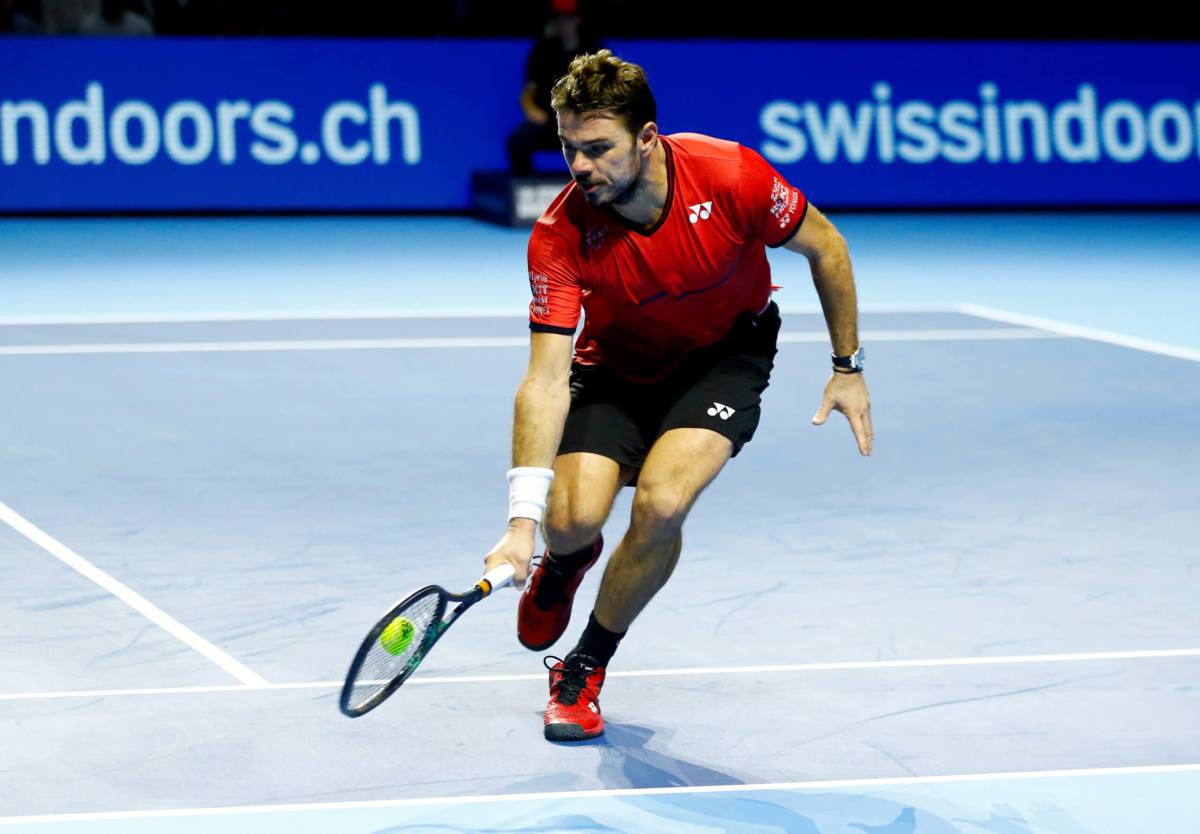 Wawrinka sets up quarter-final with fellow Swiss Federer