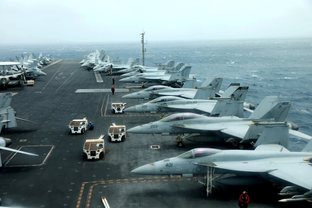 U.S. aircraft carrier strike group sails through Strait of Hormuz ...