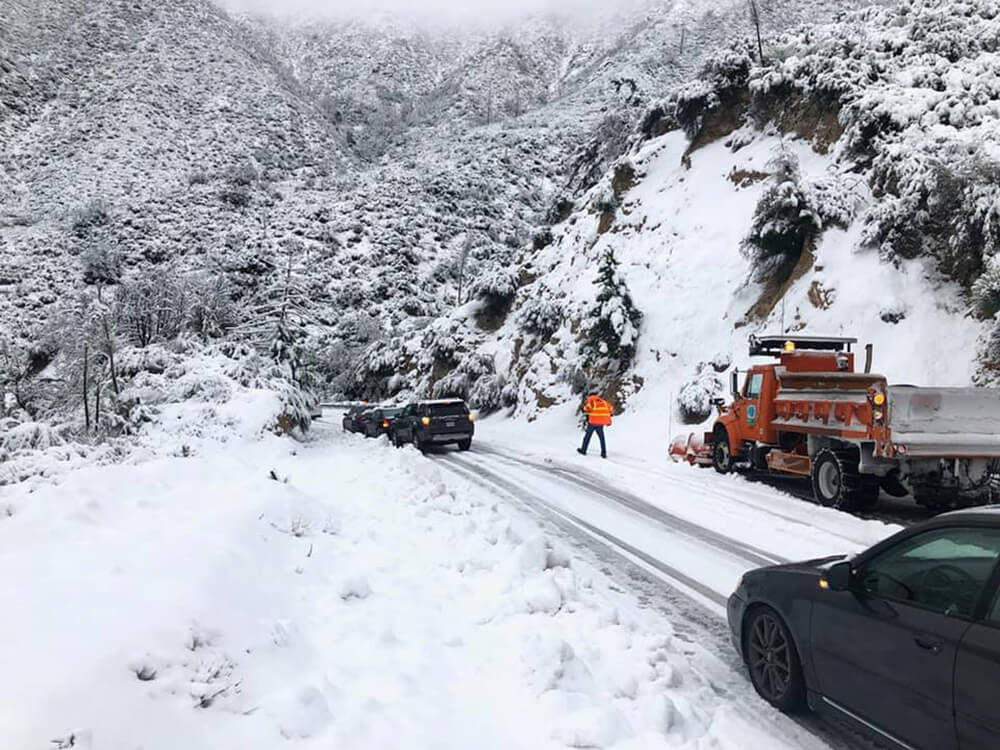 California snowbound highway reopens but storm snarls Thanksgiving