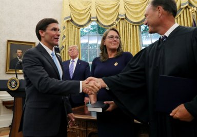 Former lobbyist Esper sworn in as Pentagon chief