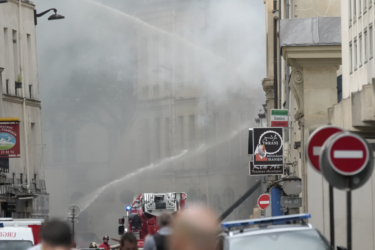 Paris police look at gas leak as possible cause of explosion and fire