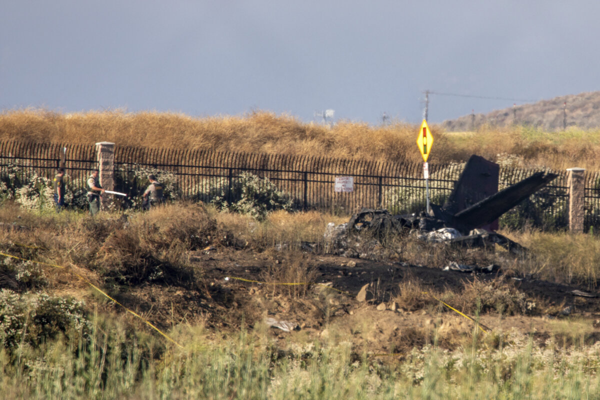 Six killed when small plane crashes, bursts into flames in field near