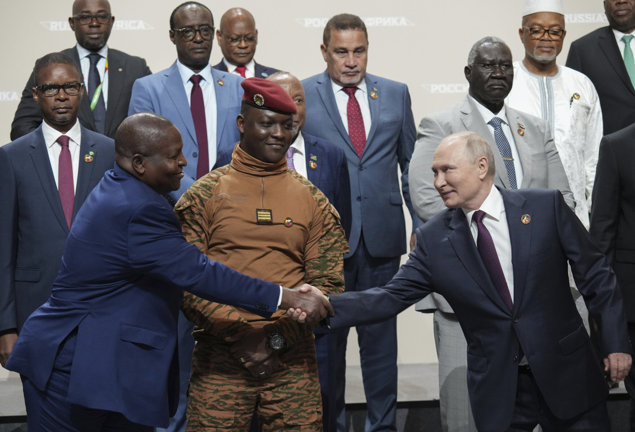 Putin woos African leaders at a summit in Russia with promises of ...