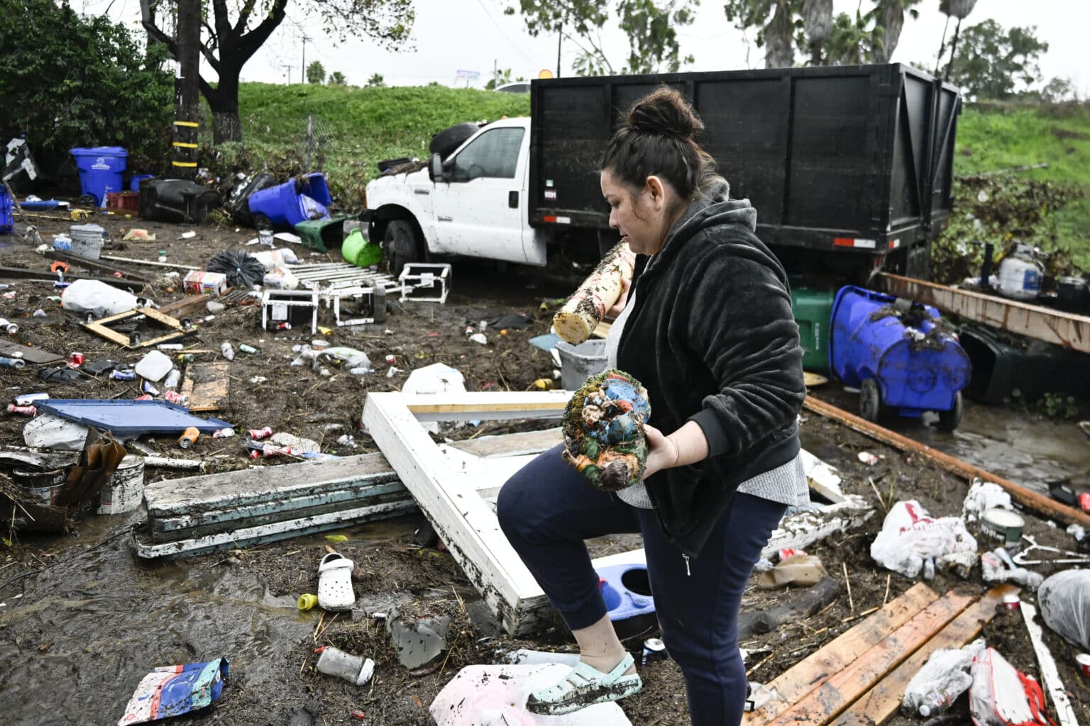 San Diegans cry, hug, outside damaged homes after stunning flash floods