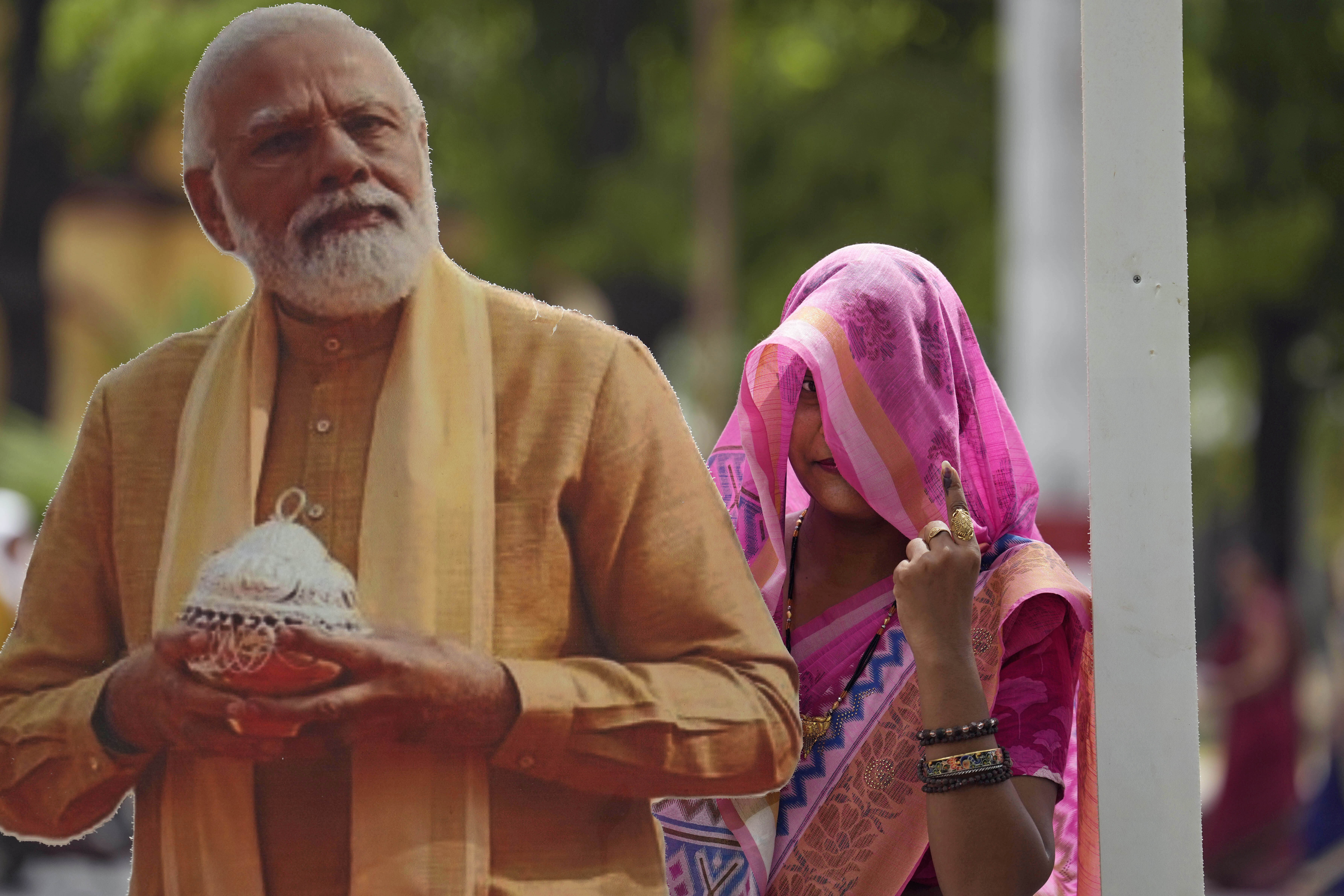 The Latest India counts votes from a megaelection seen as a