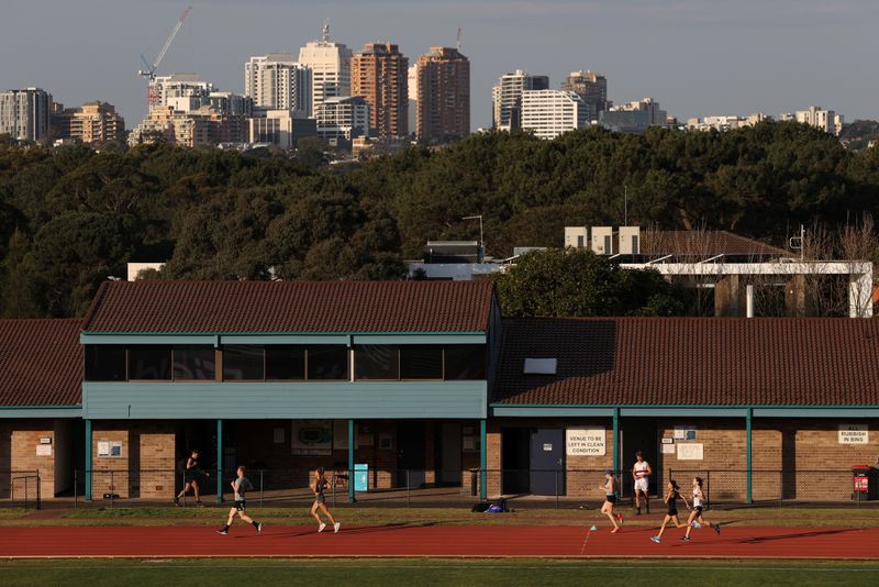 People exercise at a re-opened athletics facility in Sydney