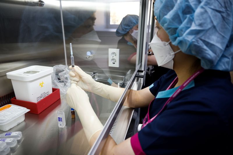 A nurse takes part in the coronavirus disease (COVID-19) vaccination