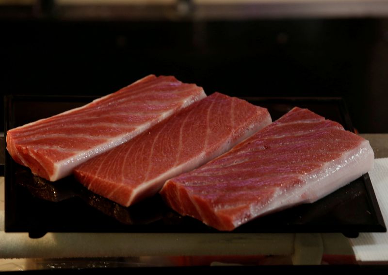 FILE PHOTO: Meat from a 278kg bluefin tuna, priced with