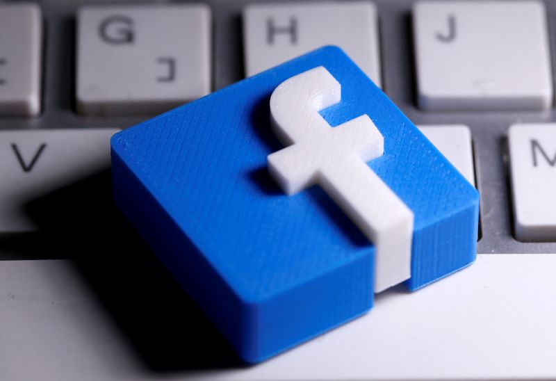 FILE PHOTO: A 3D-printed Facebook logo is seen placed on