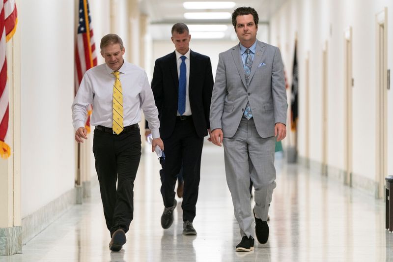 U.S. Reps. Jim Jordan (R-OH) and Matt Gaetz (R-FL) walk