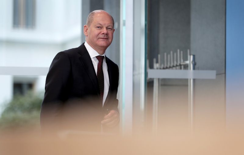 German Finance Minister Olaf Scholz attends a news conference in