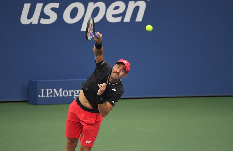 Johnson withstands Isner storm to advance at US Open Metro US