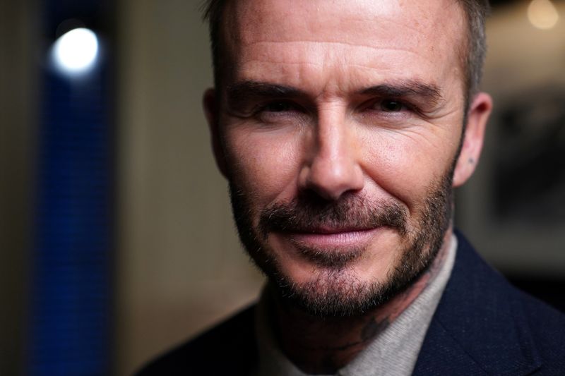 Former soccer player and MLS team owner David Beckham poses