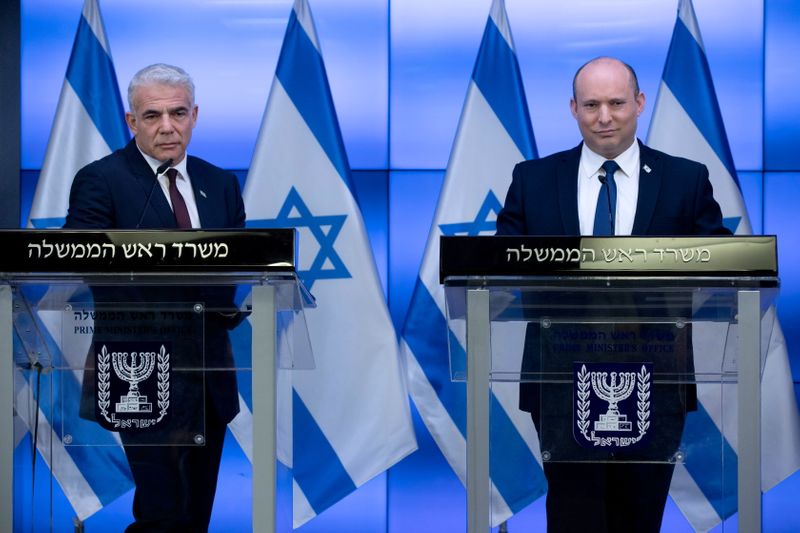 Israeli Prime Minister Naftali Bennett attends a news conference in