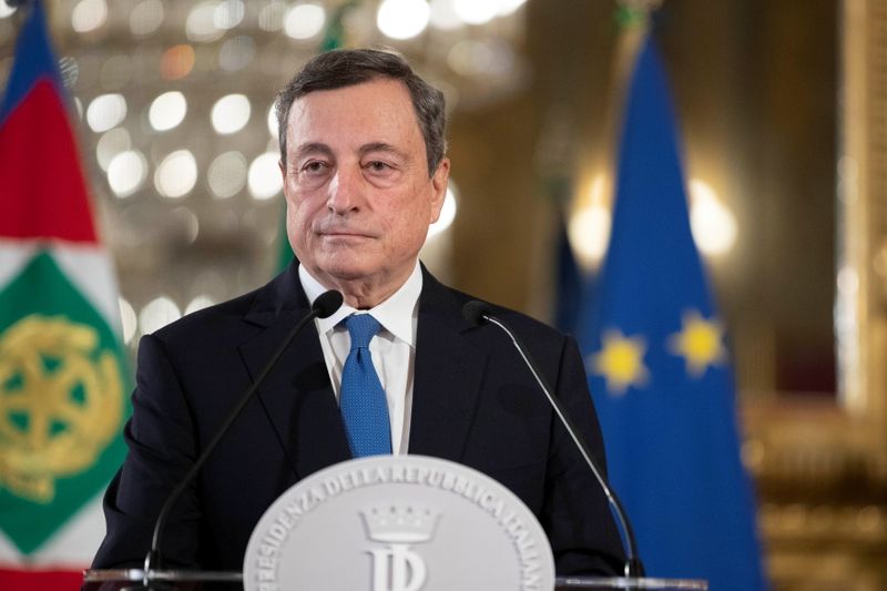 Former European Central Bank President Mario Draghi pauses as he