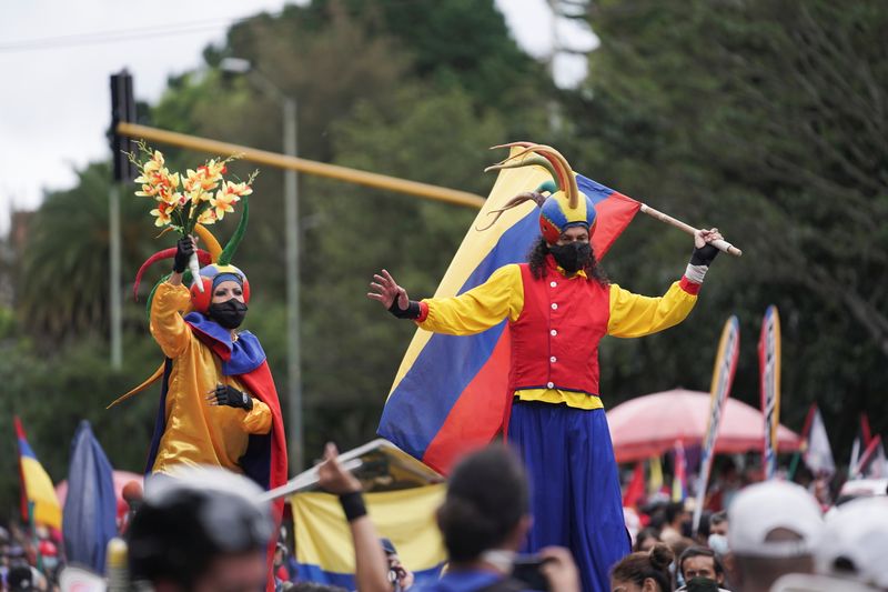 Demonstrators gather for an anti-government march demanding changes to the