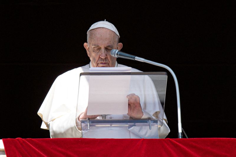 FILE PHOTO: Pope Francis leads the Angelus prayer at the